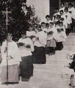 Image of John Steinbeck immediately behind the crucifer leaving old St. Paul's Episcopal Church in Salinas, California