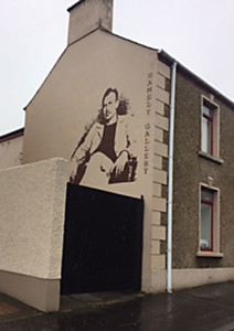 Imge of John Steinbeck mural in Bushmill's, Northern Ireland